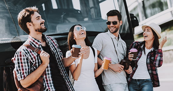 passengers happily boarding a bus